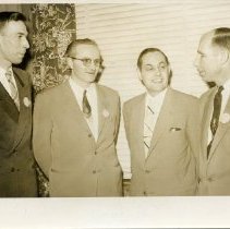 W. Fraser with Three Unidentified Men
